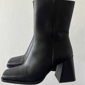 Mid-ankle length black platform boots